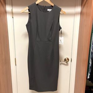Calvin Klein gray dress. Very flattering fit. Never worn.